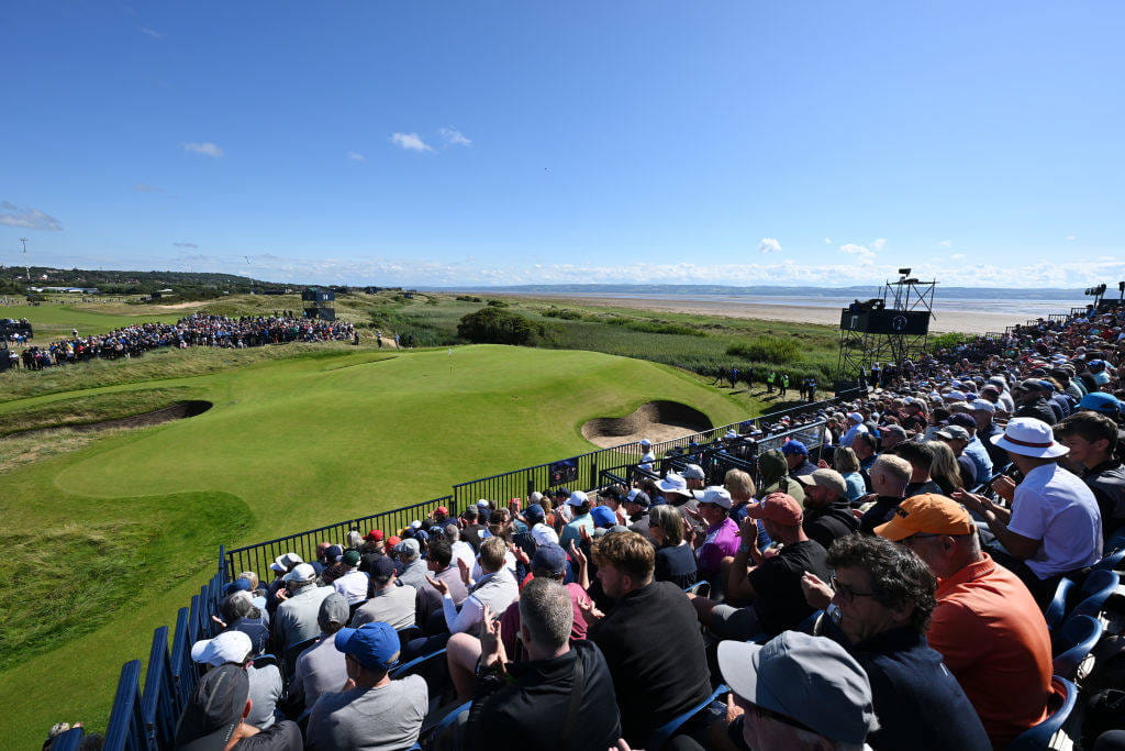Fans gather by the 17th green during a practice round at Royal Liverpool